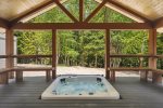 Take a soak in the hot tub and enjoy the views 